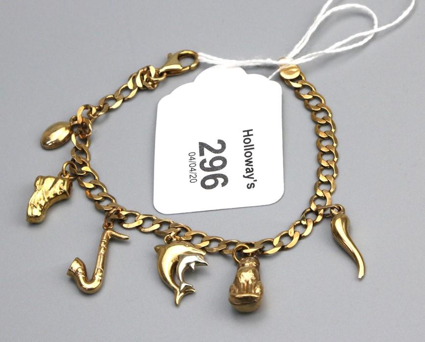 Lot 120 - A 9ct gold charm bracelet