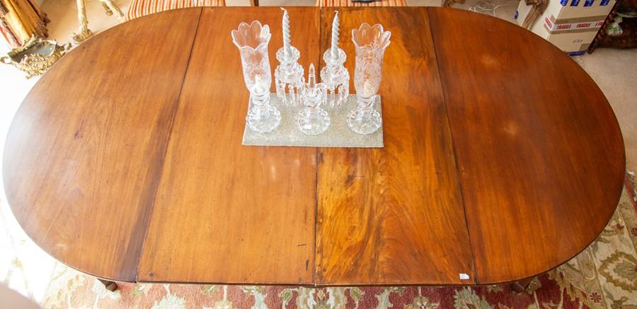 Lot - A Regency style mahogany drop leaf pedestal table late 19th