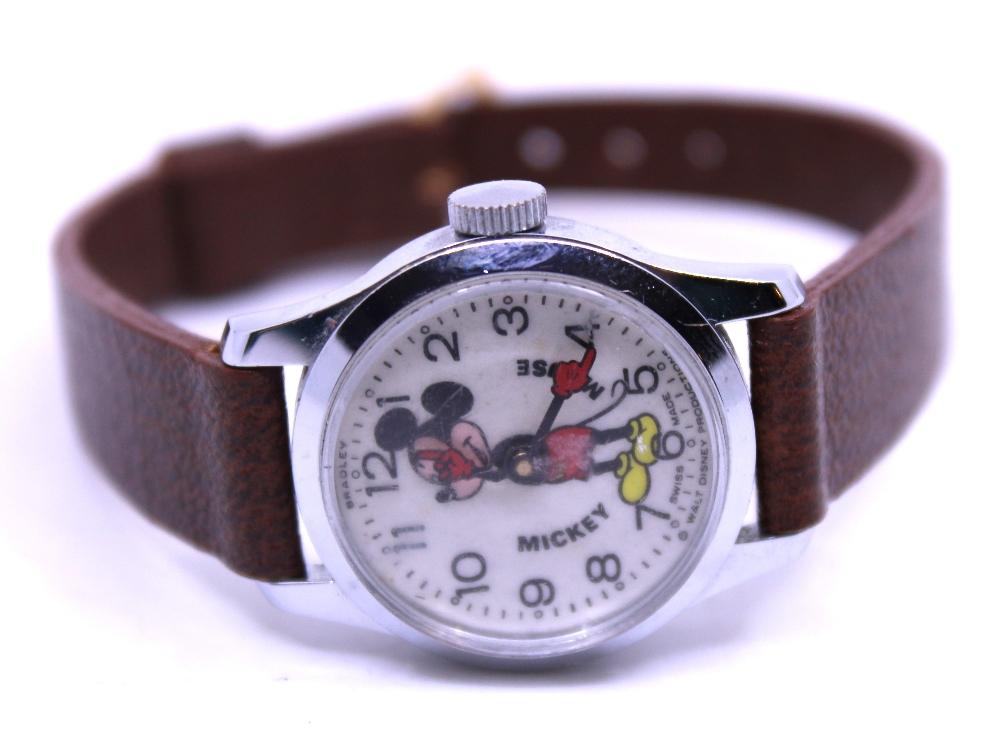 Vintage 1960s 1970 s Mickey Mouse Watch. This watch is made by the company Bradley and was made for Walt Disney Productions. The watch is Swiss made. The watch face measures approx. 25mm x