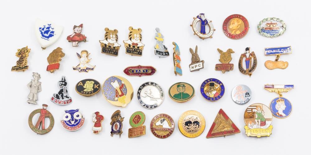 An assortment of 20th century enamel and gilt metal badges comprising ...