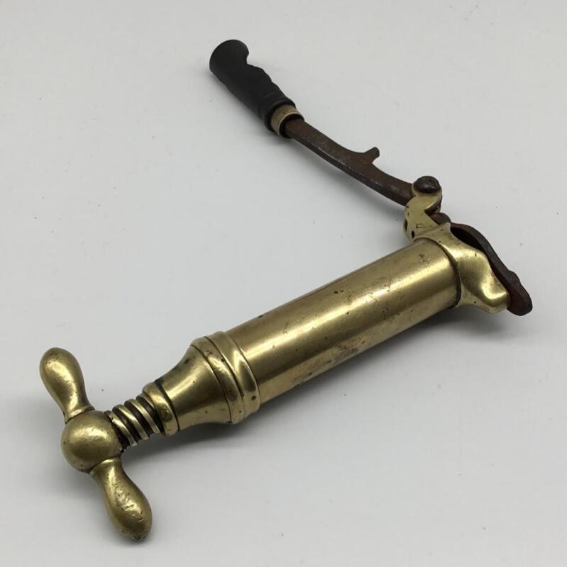 An antique screw-type hand de-recapping tool for 12 bore shotgun ...