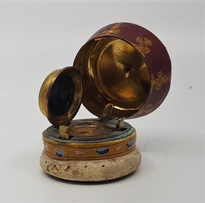 A Late 19th Century Leather Covered Shaped Travelling Ink Well 