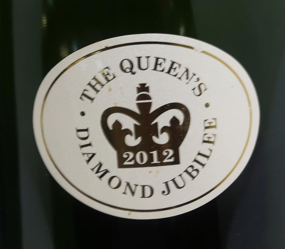 Three empty bottles of Moet and Chandon used for the Queen's