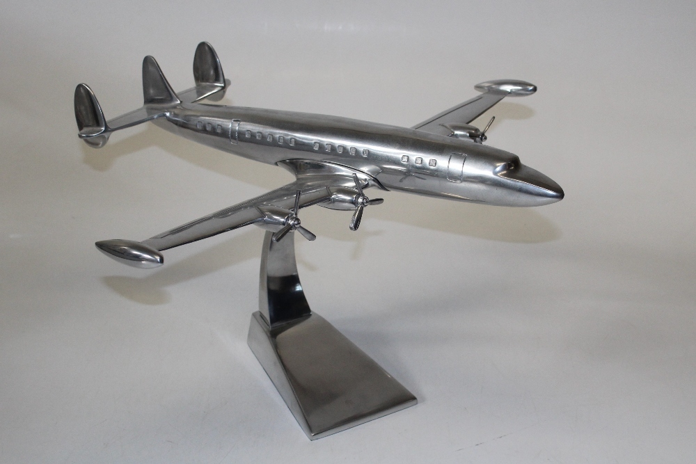 A polished aluminium model of a Lockheed Constellation passenger plane ...