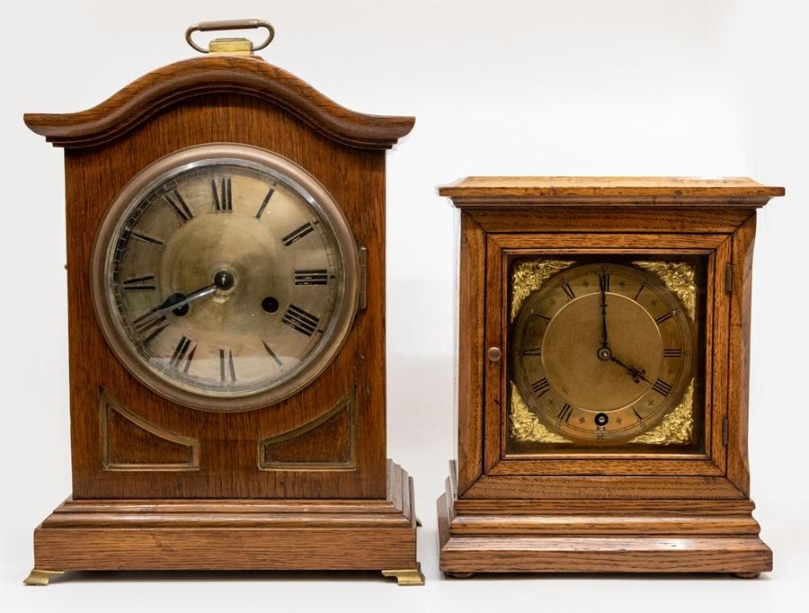 A German oak bracket clock early 20th Century with arched top