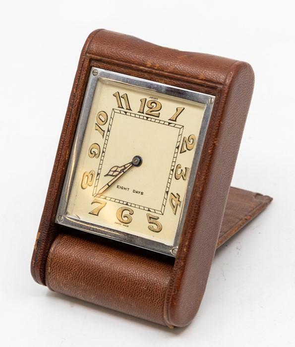 A Jaeger LeCoultre leather cased travel clock with eight day