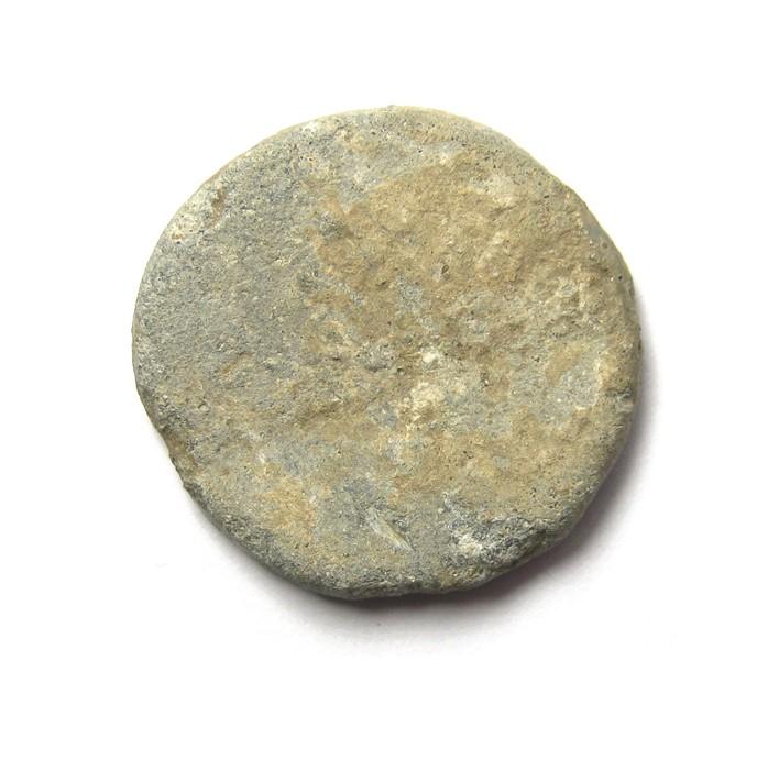 Charles I Trade Weight. Circa 17th century AD. Lead, 12.78 grams. 23.60  grams. A round lead trade weight market with a crown over CR. Issued during  the reign of Charles I. Ref