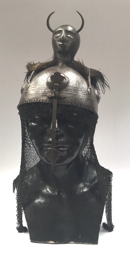 A 19th century Indo-Persian Kalah Khud helmet. Featuring a one piece ...
