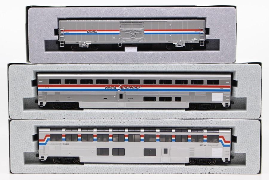 Kato: A collection of three boxed Kato, Amtrak Superliner, to