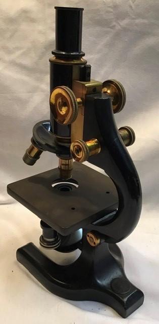 Spencer Lens company microscope model 25H, 1920. In wooden case