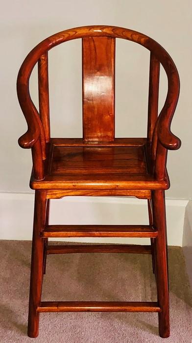 A Chinese elm stool, bow scrolling rail on a rectangular ...